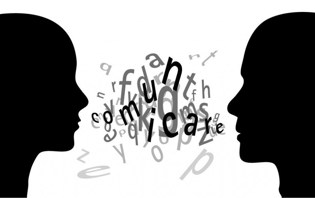 Two silhouettes facing each other with words between them, representing communication